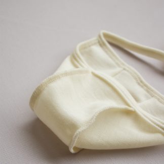 Czapka bonetka z wełny merino – miękka, oddychająca i hipoalergiczna. Naturalna ochrona główki niemowlęcia, idealna od pierwszych dni życia.