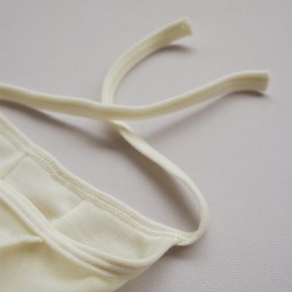 Czapka bonetka z wełny merino – miękka, oddychająca i hipoalergiczna. Naturalna ochrona główki niemowlęcia, idealna od pierwszych dni życia.